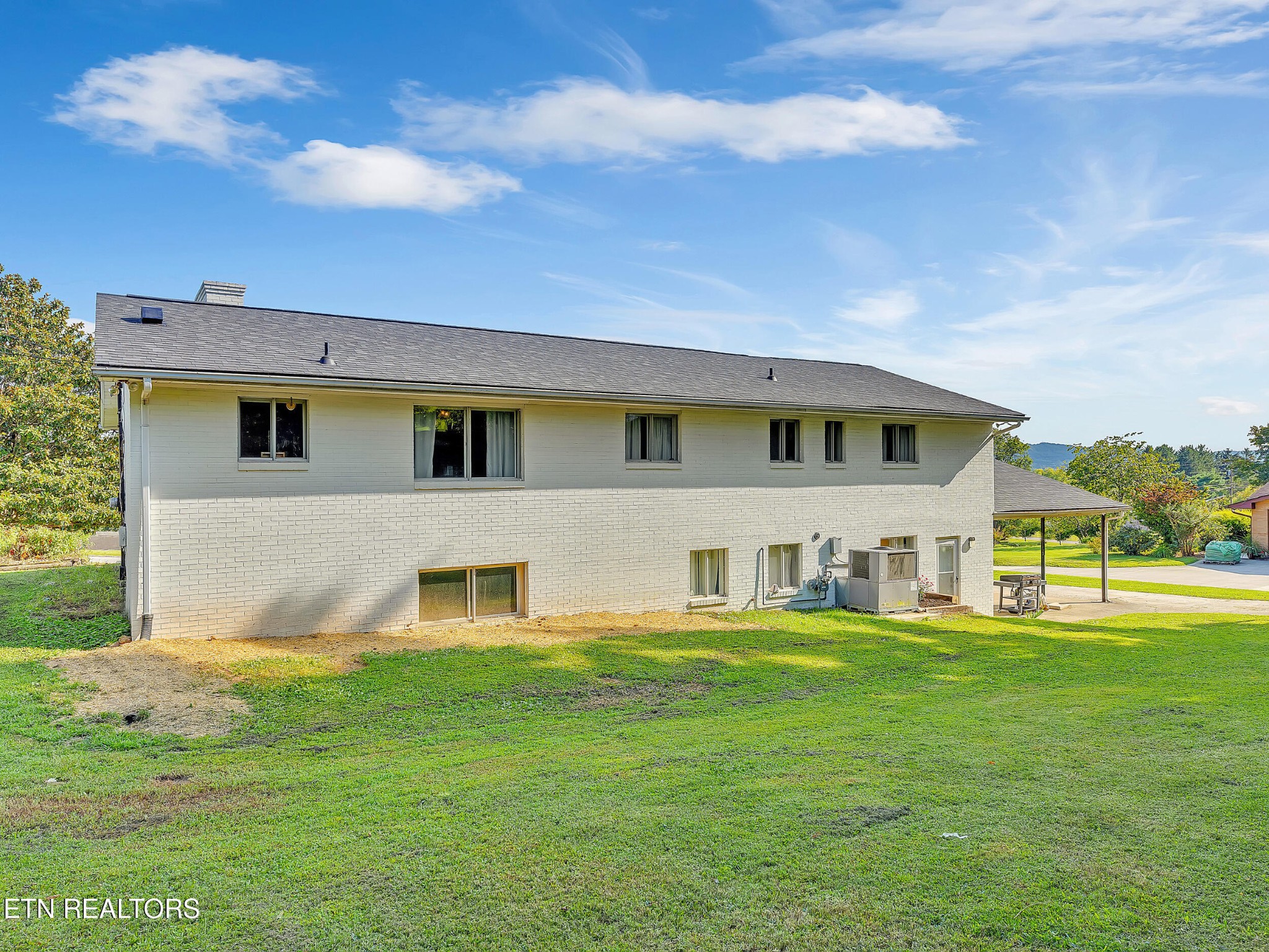 217 Mayview Drive Powell, TN 37849 - Photo 34 of 42 a front view of a house with a yard