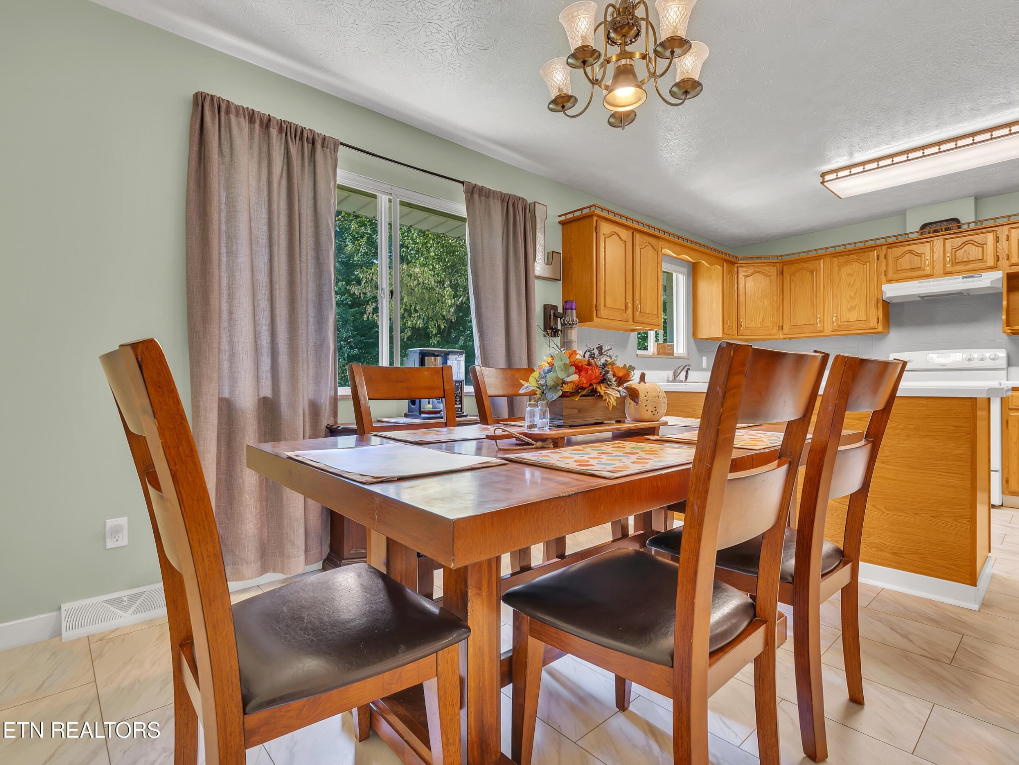 217 Mayview Drive Powell, TN 37849 - Photo 10 of 42 a dining room with furniture and window