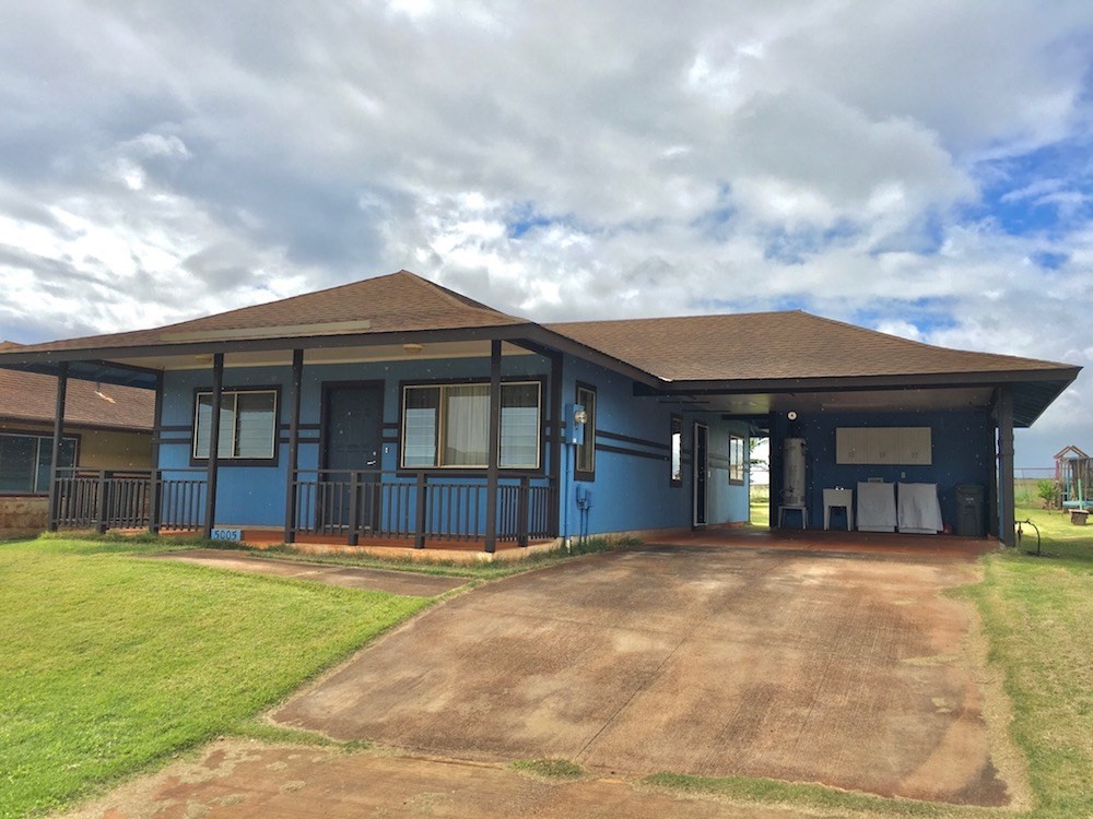 5005 Moi Road Hanapepe, HI 96716 - Photo 11 of 17 a front view of a house with a yard
