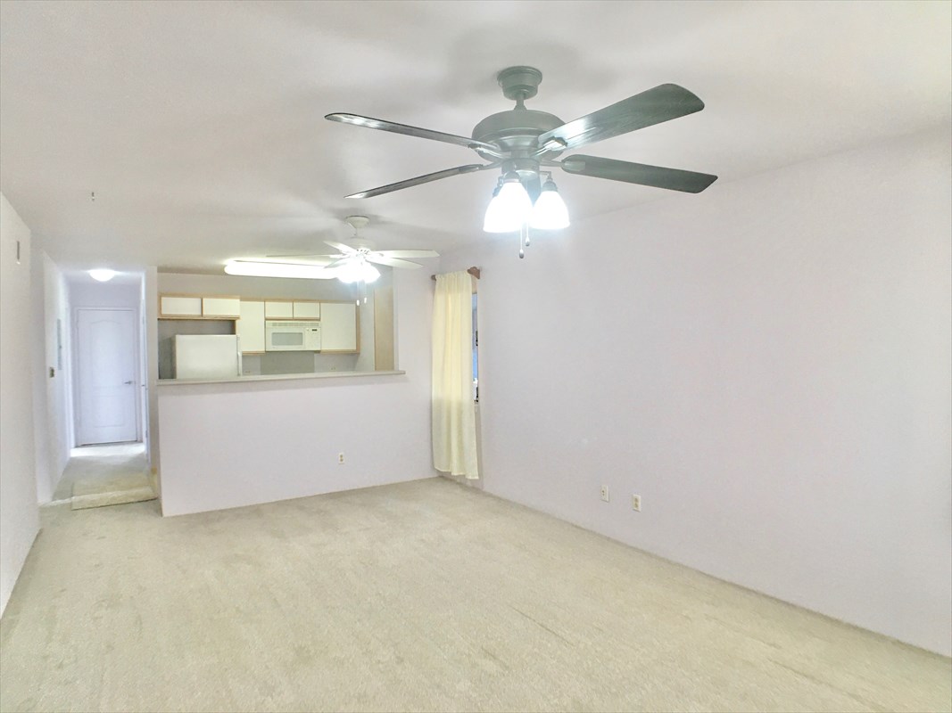 5005 Moi Road Hanapepe, HI 96716 - Photo 2 of 17 wooden floor in an empty room with a window