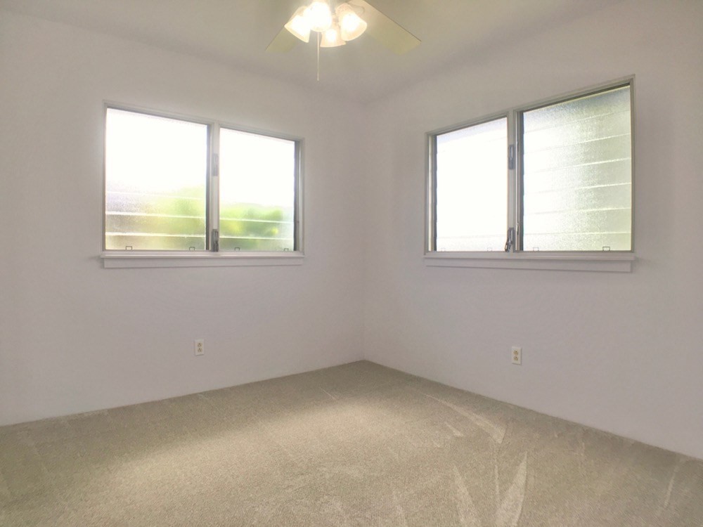 5005 Moi Road Hanapepe, HI 96716 - Photo 8 of 17 an empty room with a window
