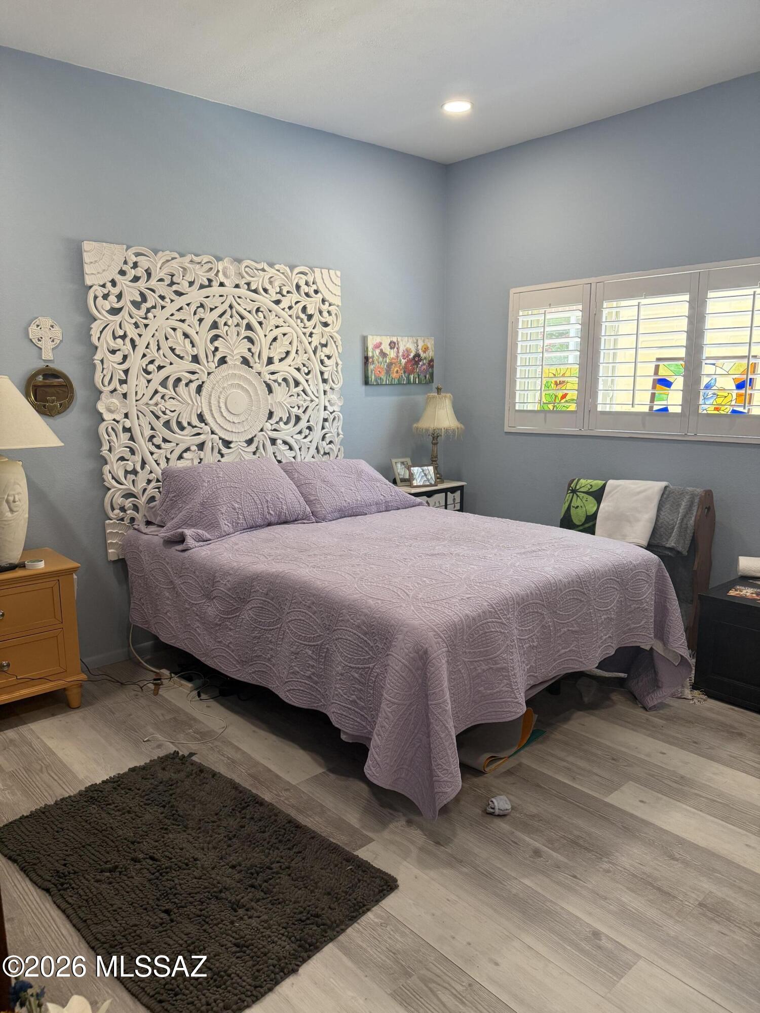 8110 East Rivenoak Circle Tucson, AZ 85715 - Photo 17 of 29 a bedroom with a bed and window