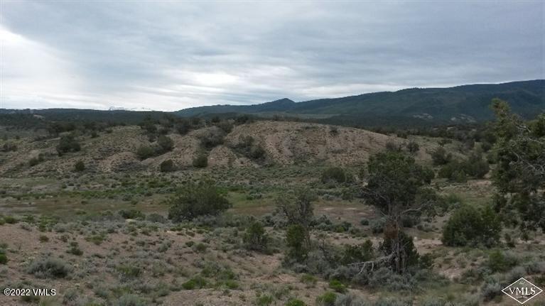 a view of mountains and valleys