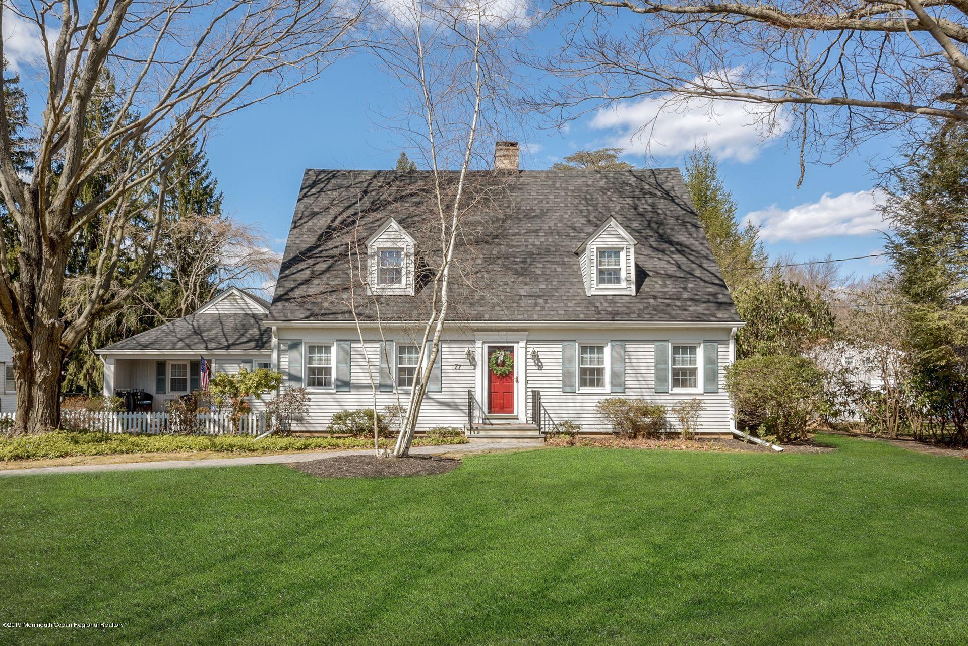 a front view of a building with garden