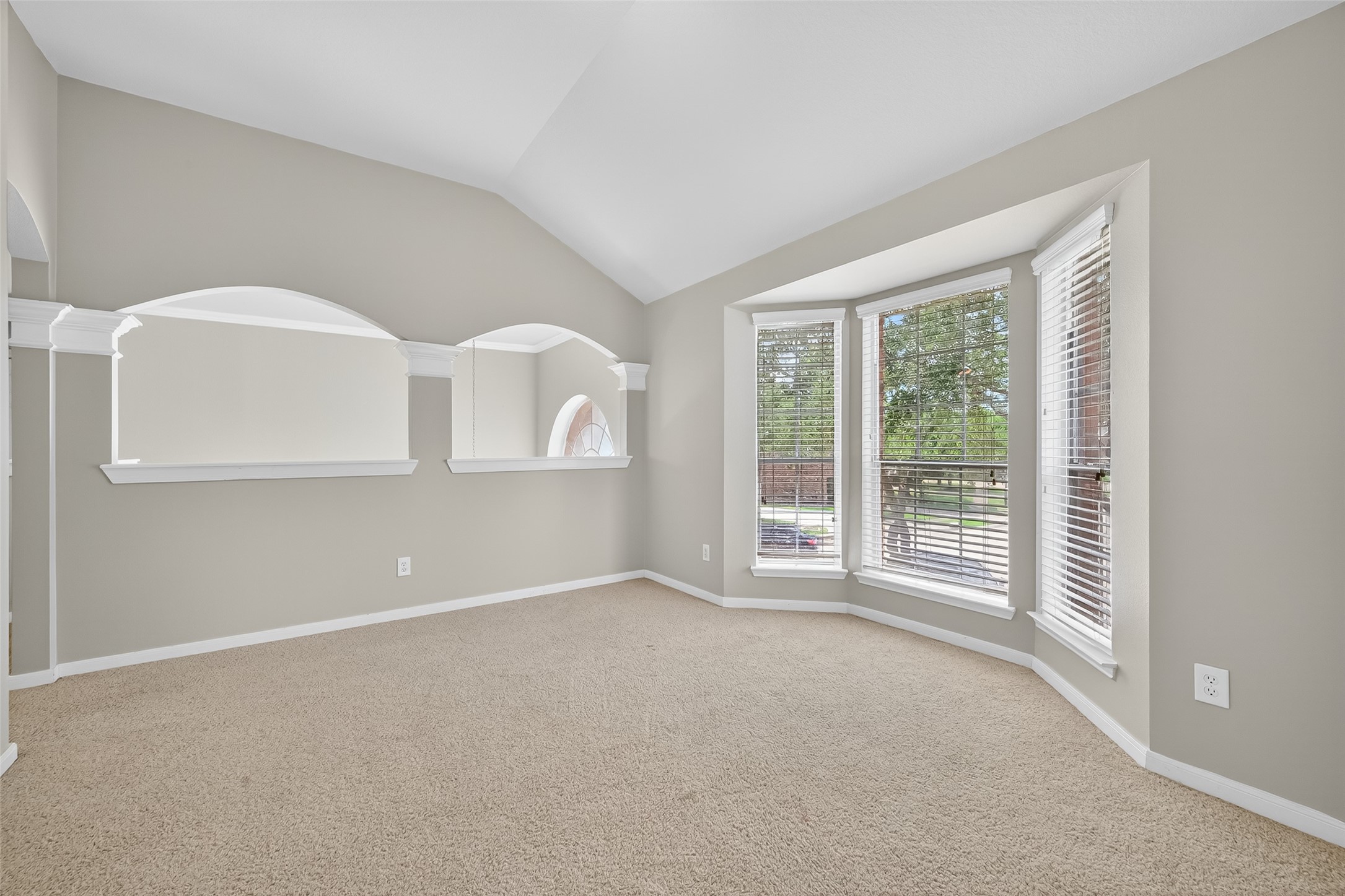 12902 Crystal Reef Court Pearland, TX 77584 - Photo 17 of 35 an empty room with windows