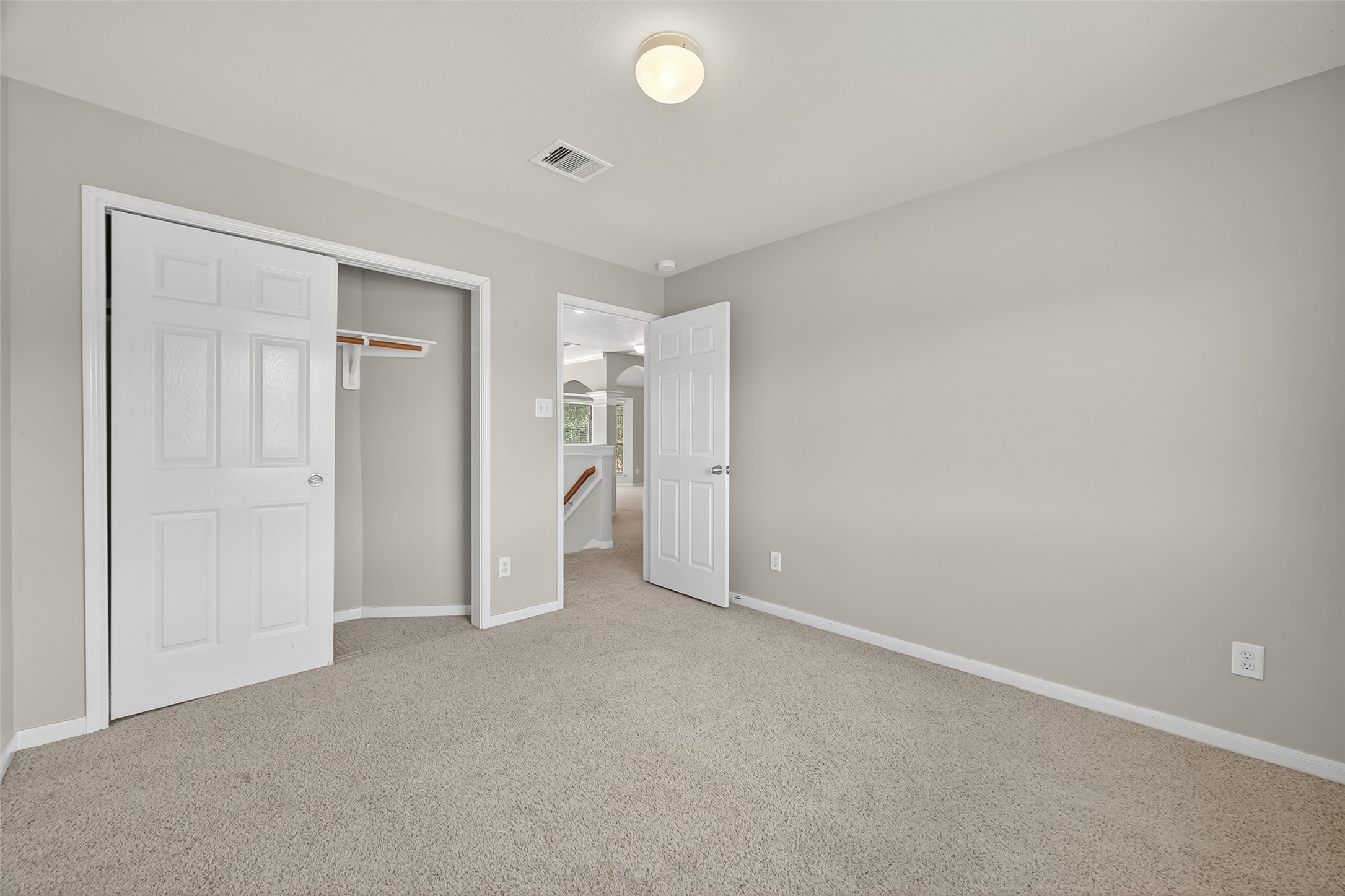 12902 Crystal Reef Court Pearland, TX 77584 - Photo 26 of 35 an empty room with closet area