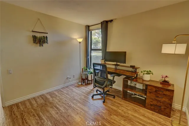 a view of livingroom with washer and dryer