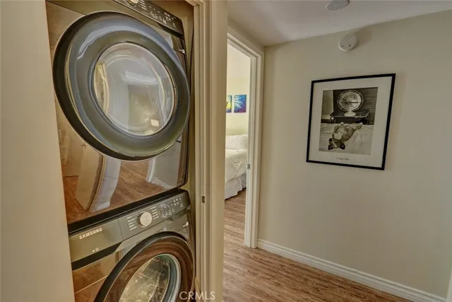 a view of a house with pool and sitting area