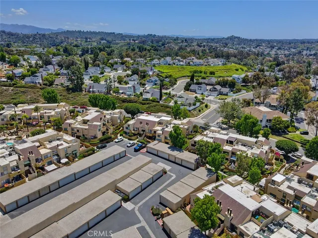 an aerial view of a city with lots of residential buildings