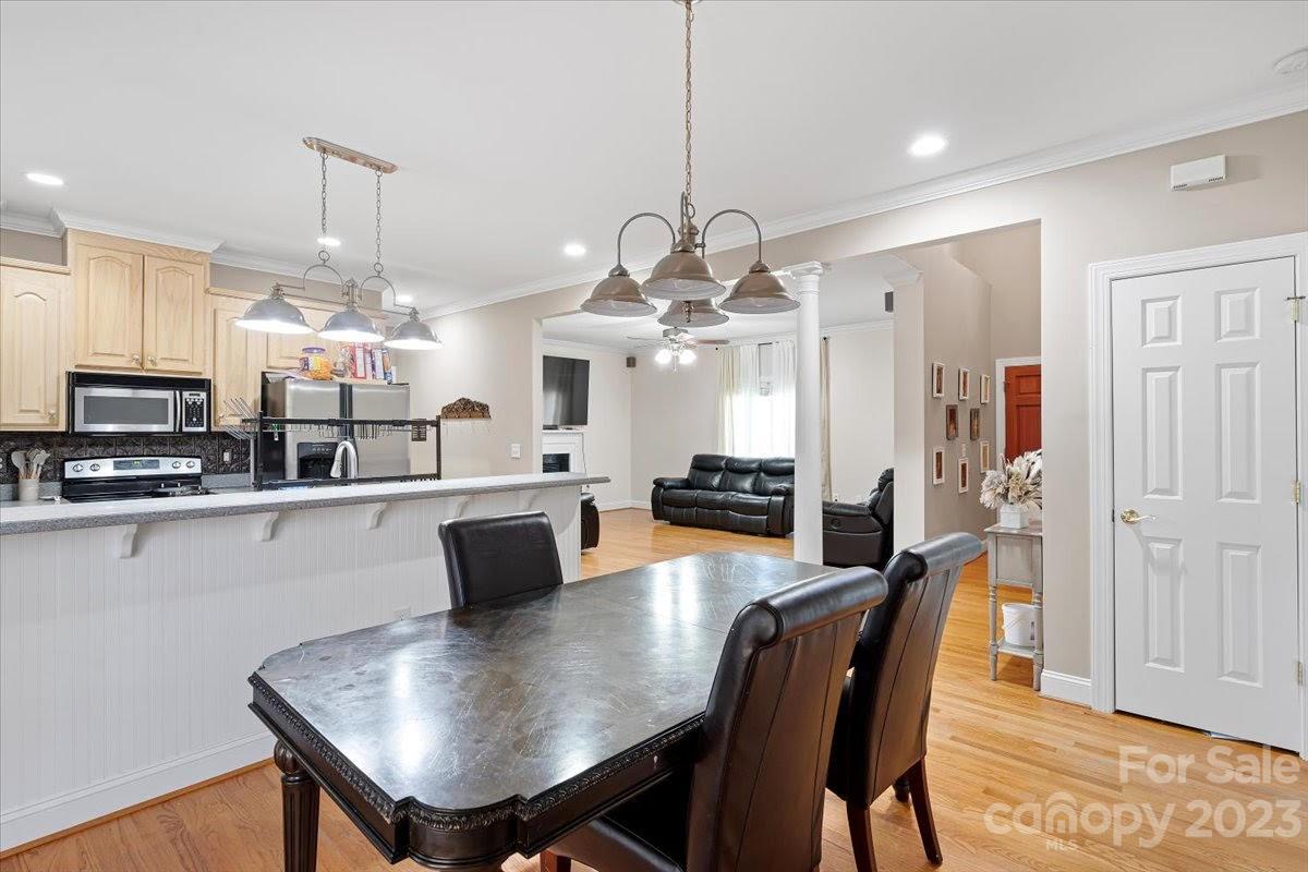 1531 Henry Smith Road Monroe, NC 28110 - Photo 12 of 31 a view of kitchen and dining area with furniture