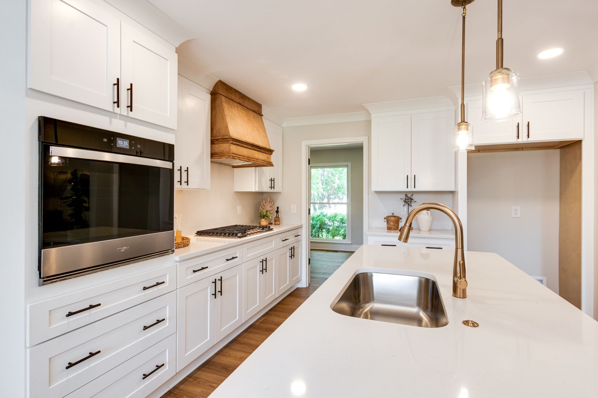 2302 Surrey Drive Murfreesboro, TN 37129 - Photo 11 of 26 a kitchen with sink a stove and cabinets