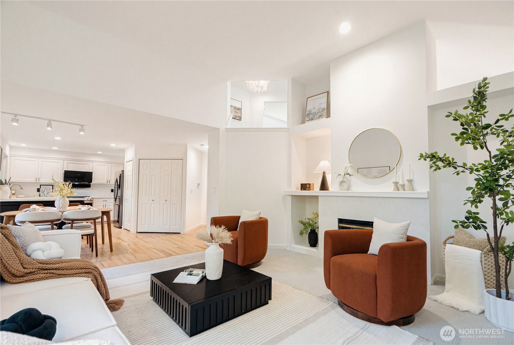 4016 243rd Place Southeast Issaquah, WA 98029 - Photo 14 of 35 a living room with furniture and a potted plant