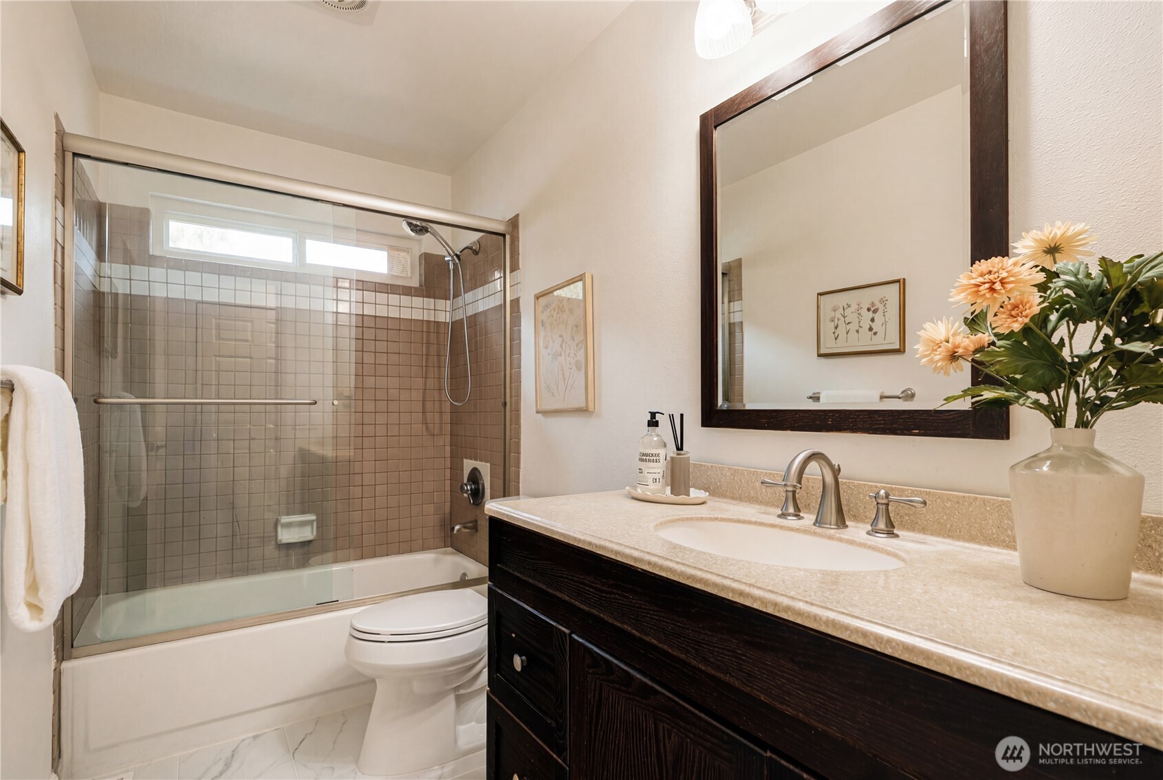 4016 243rd Place Southeast Issaquah, WA 98029 - Photo 20 of 35 a bathroom with a sink a toilet and shower