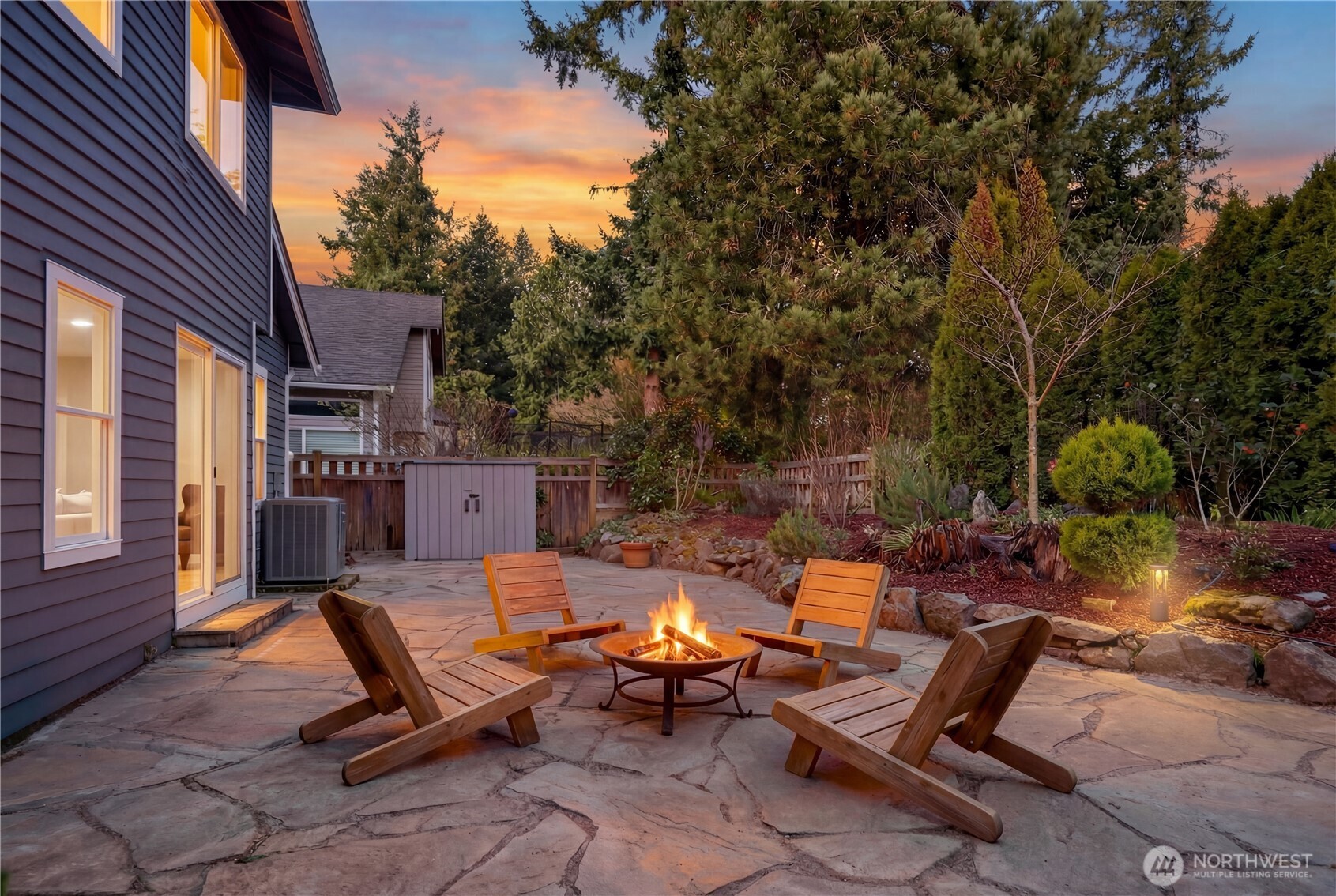 4016 243rd Place Southeast Issaquah, WA 98029 - Photo 24 of 35 a backyard of a house with outdoor seating