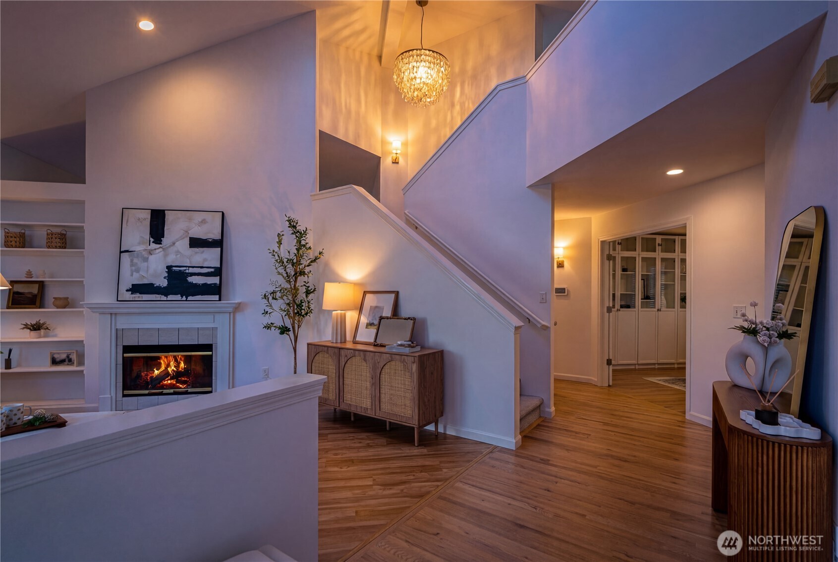 4016 243rd Place Southeast Issaquah, WA 98029 - Photo 26 of 35 a view of a livingroom with wooden floor and a fireplace