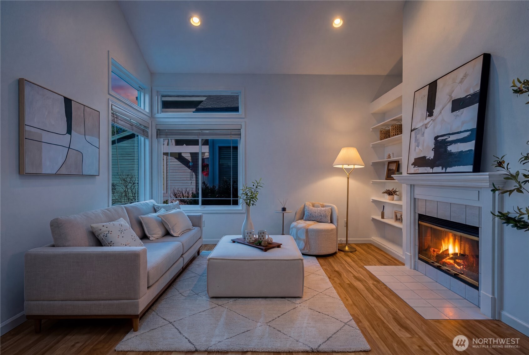 4016 243rd Place Southeast Issaquah, WA 98029 - Photo 27 of 35 a living room with furniture and a fireplace
