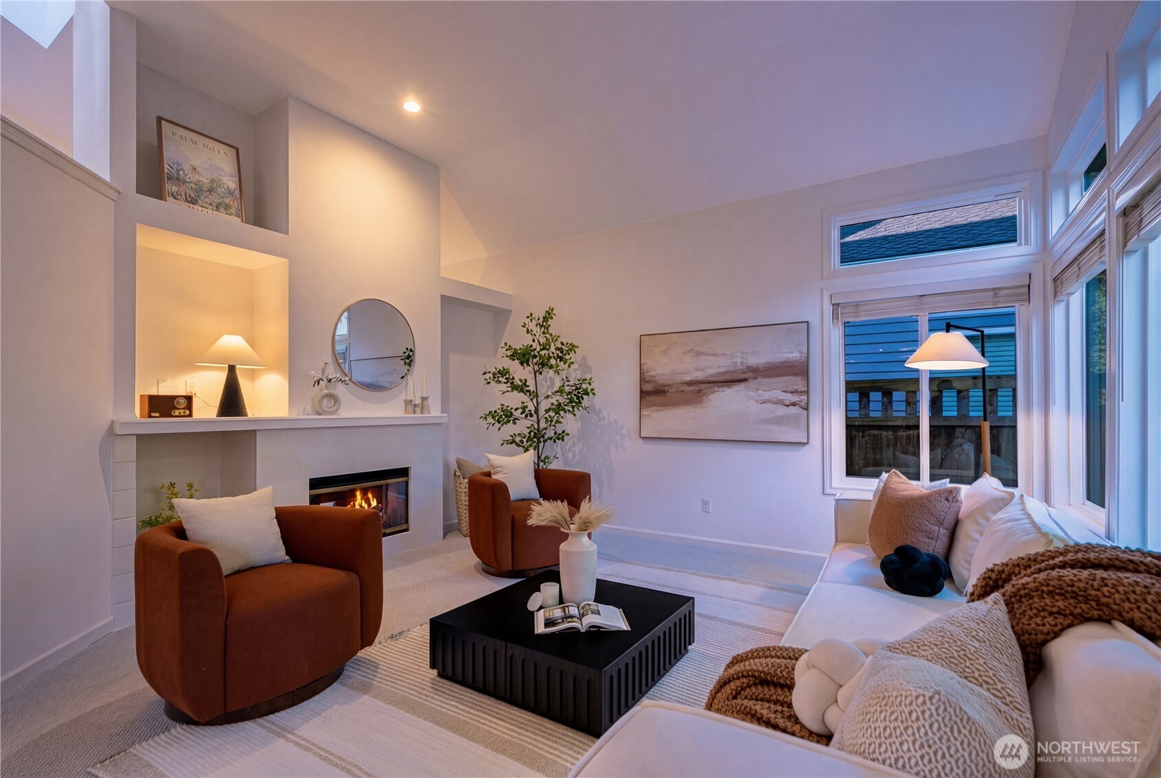 4016 243rd Place Southeast Issaquah, WA 98029 - Photo 28 of 35 a living room with furniture and a potted plant