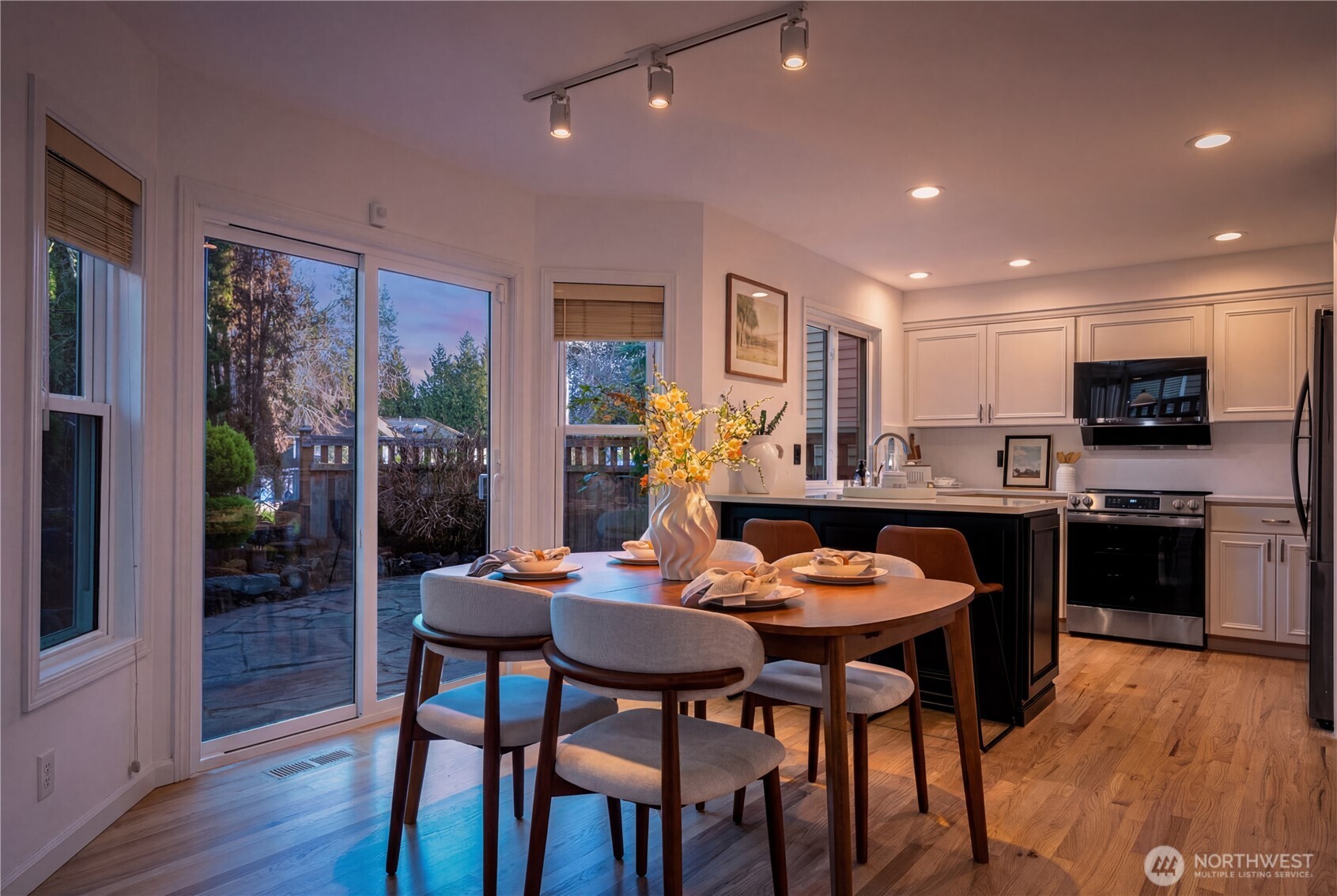 4016 243rd Place Southeast Issaquah, WA 98029 - Photo 33 of 35 a kitchen with a table and chairs in it