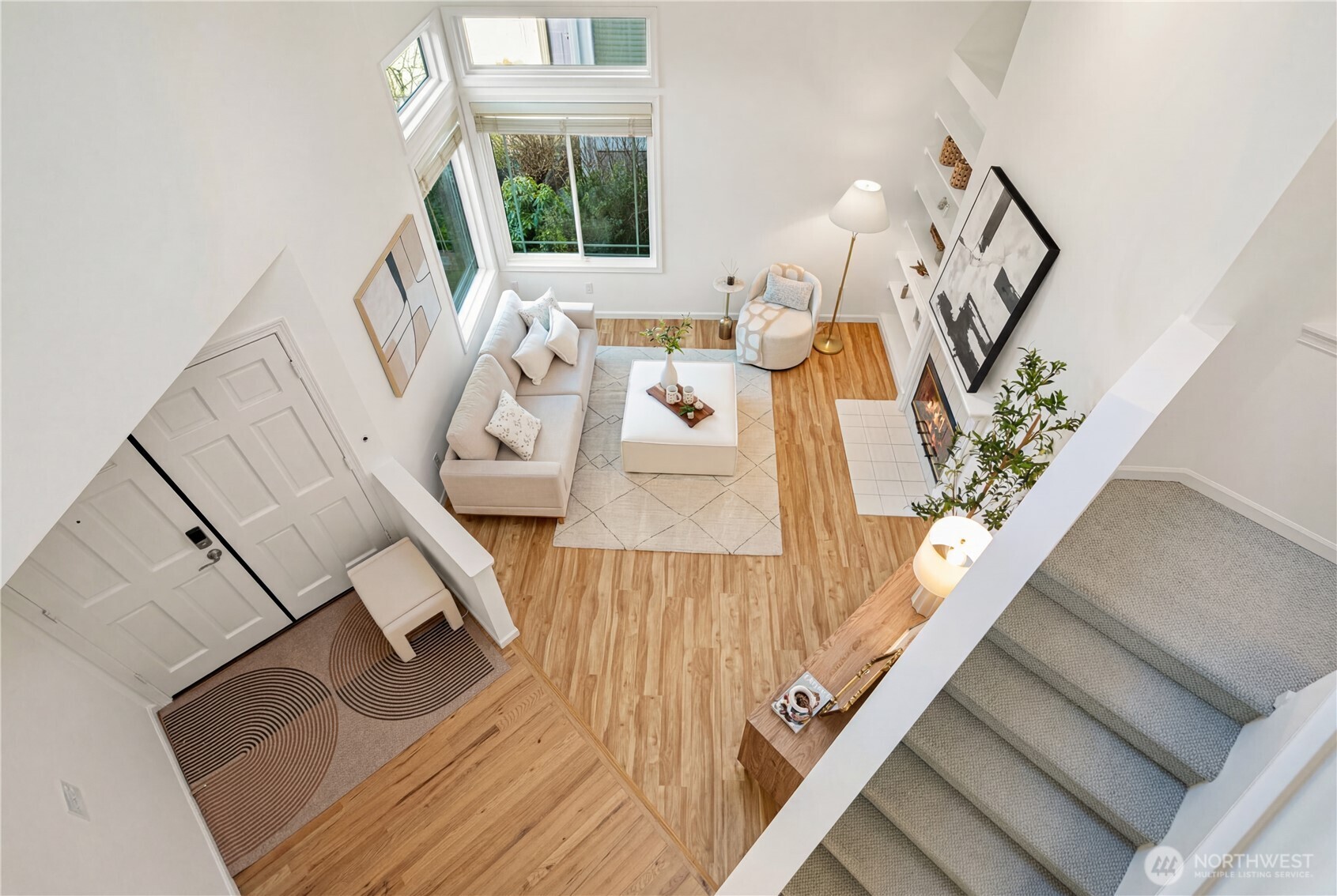 4016 243rd Place Southeast Issaquah, WA 98029 - Photo 6 of 35 a view of living room with furniture and wooden floor