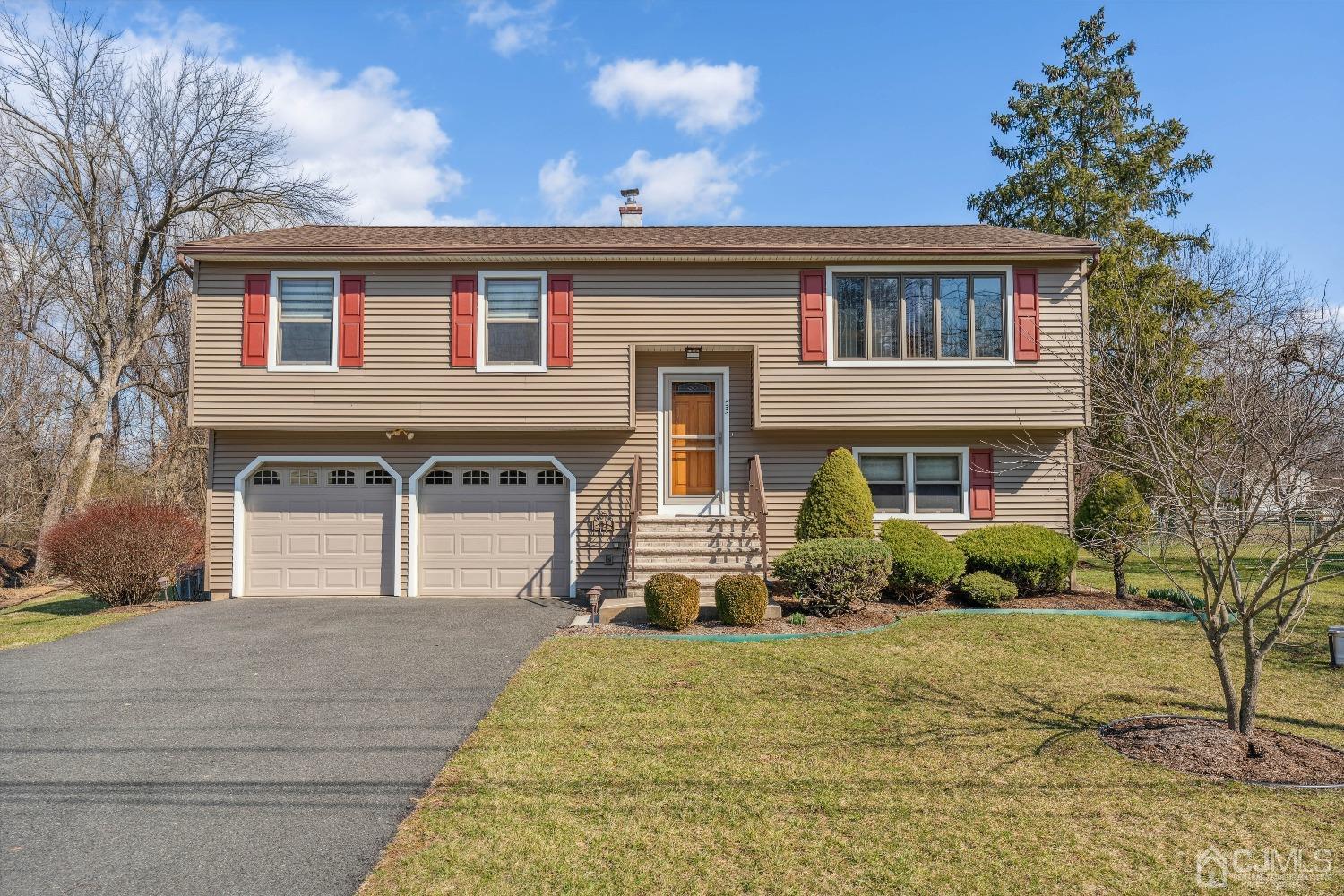 53 Bristol Road Piscataway, NJ 08854 - Photo 1 of 33 a front view of a house with a yard