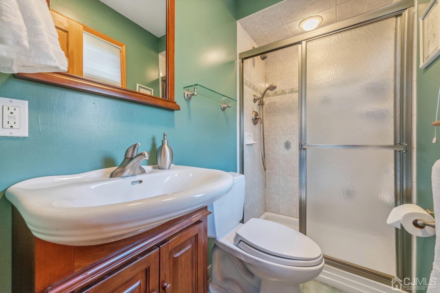 53 Bristol Road Piscataway, NJ 08854 - Photo 20 of 33 a bathroom with a sink toilet and shower