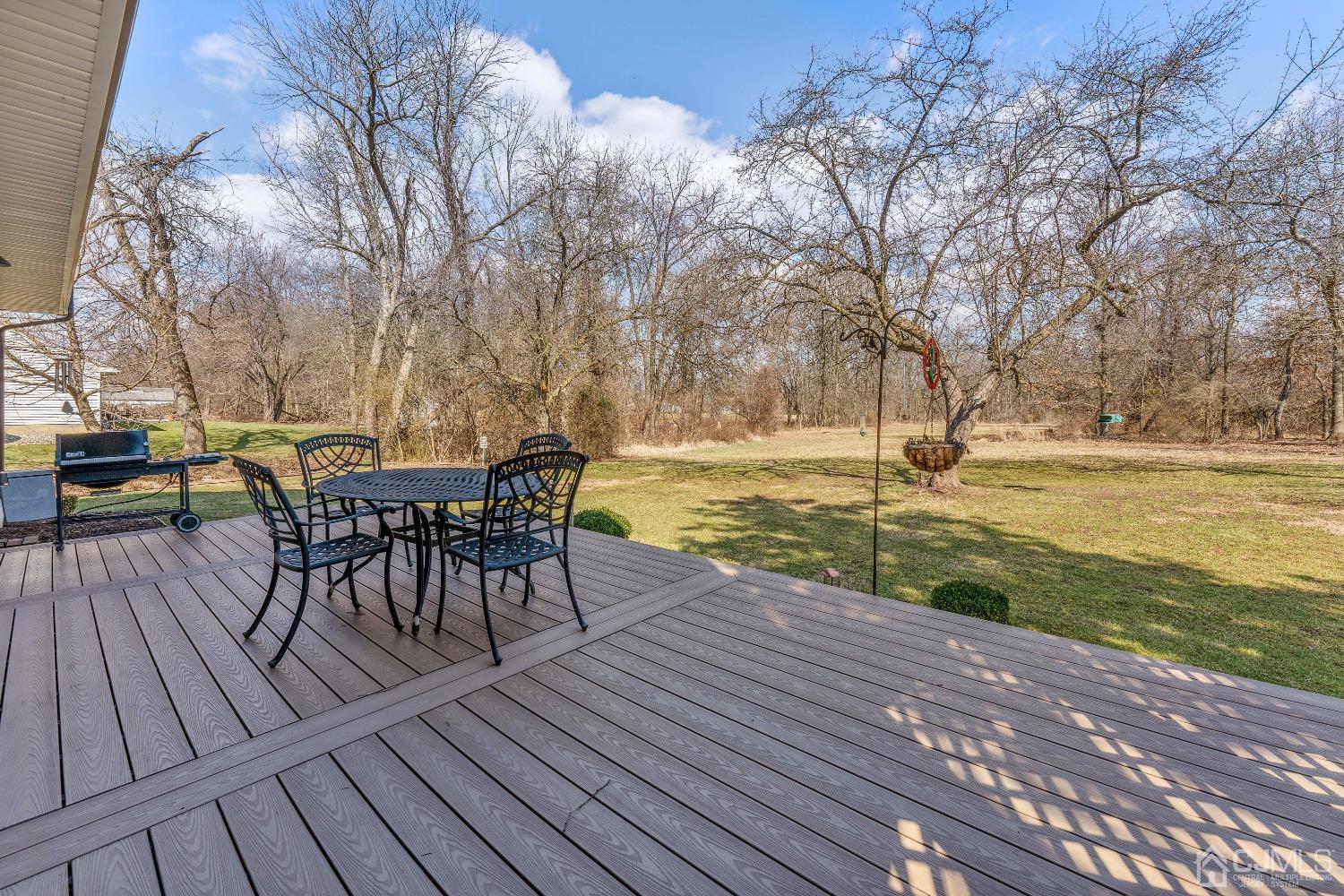 53 Bristol Road Piscataway, NJ 08854 - Photo 23 of 33 a view of a yard with a table and chairs