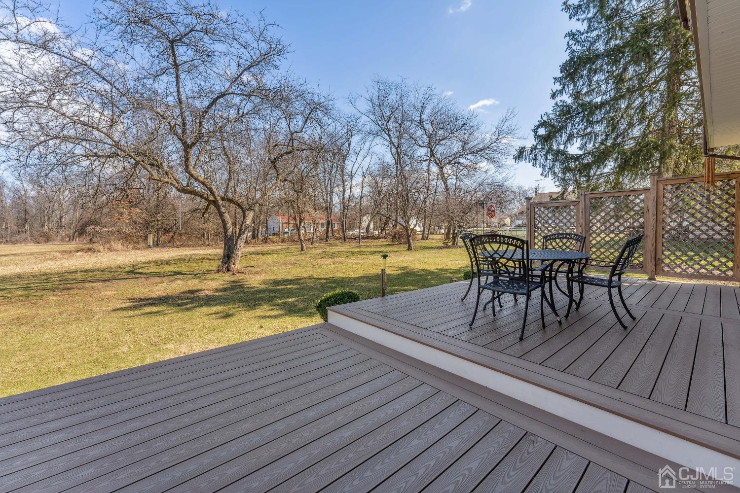 53 Bristol Road Piscataway, NJ 08854 - Photo 24 of 33 a view of a yard with a table and chairs