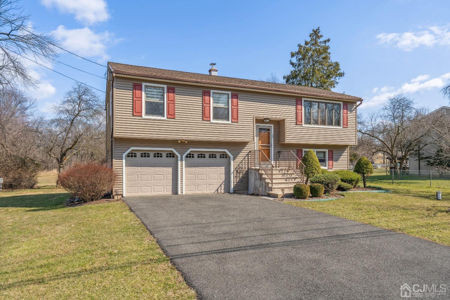53 Bristol Road Piscataway, NJ 08854 - Photo 3 of 33 a front view of a house with a yard