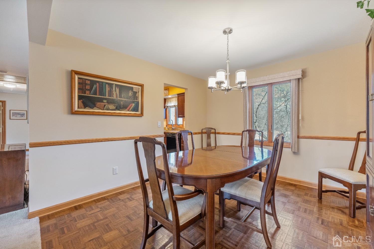 53 Bristol Road Piscataway, NJ 08854 - Photo 10 of 33 a view of a dining room with furniture window and wooden floor