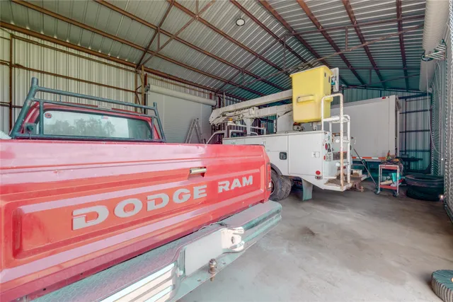 a view of grassy field with trees