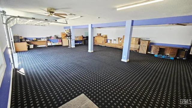 a view of a projector room with furniture