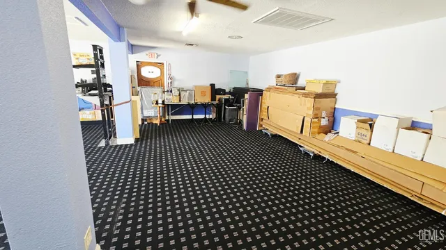 a view of a hallway view with staircase