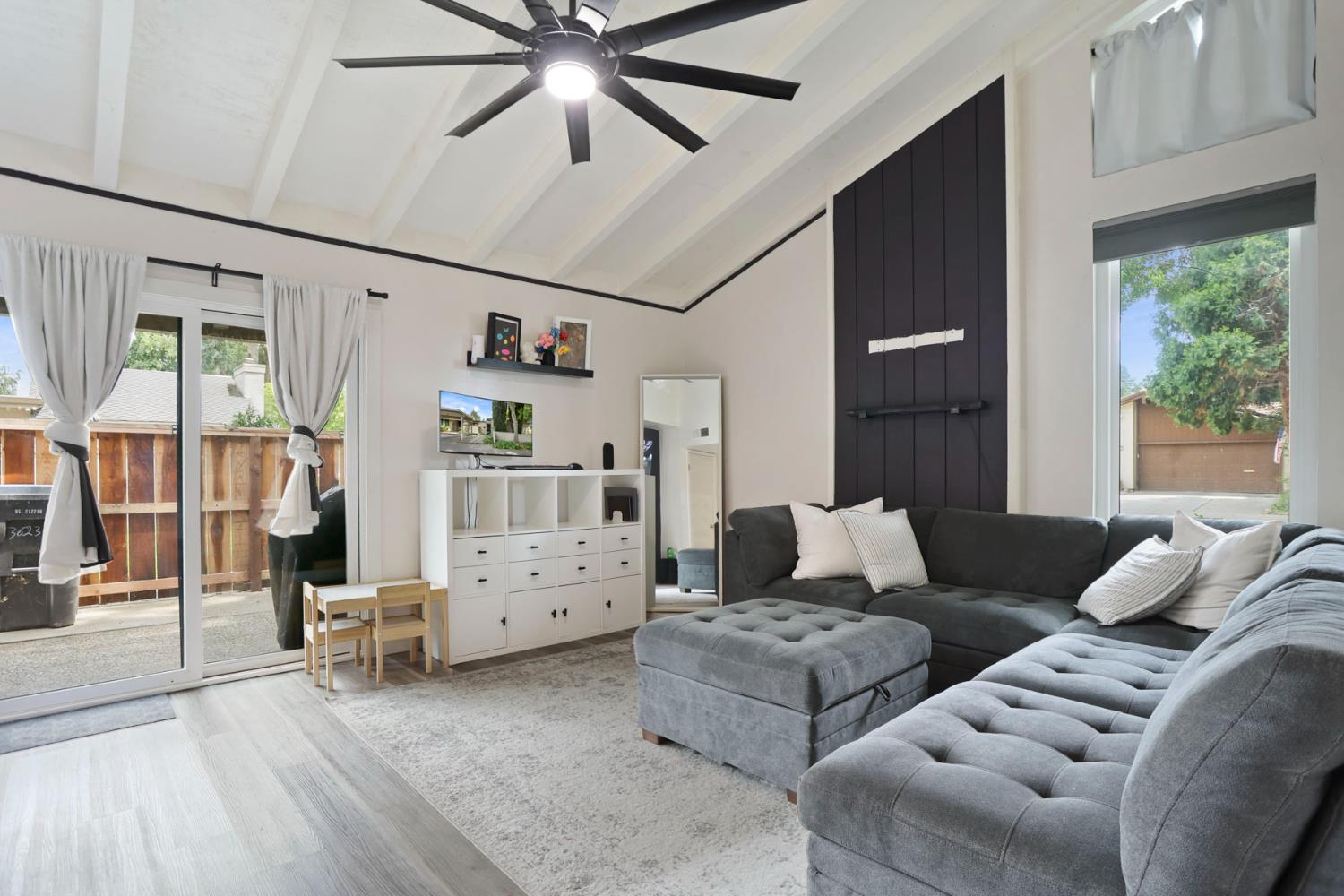 3623 Appleton Way Stockton, CA 95219 - Photo 24 of 34 cozy living room with exposed wood beams & ceiling fan