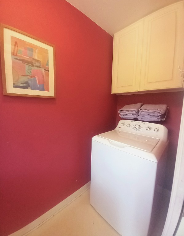 1914 West 38th Street Austin, TX 78731 - Photo 14 of 19 a utility room with a small washer and dryer