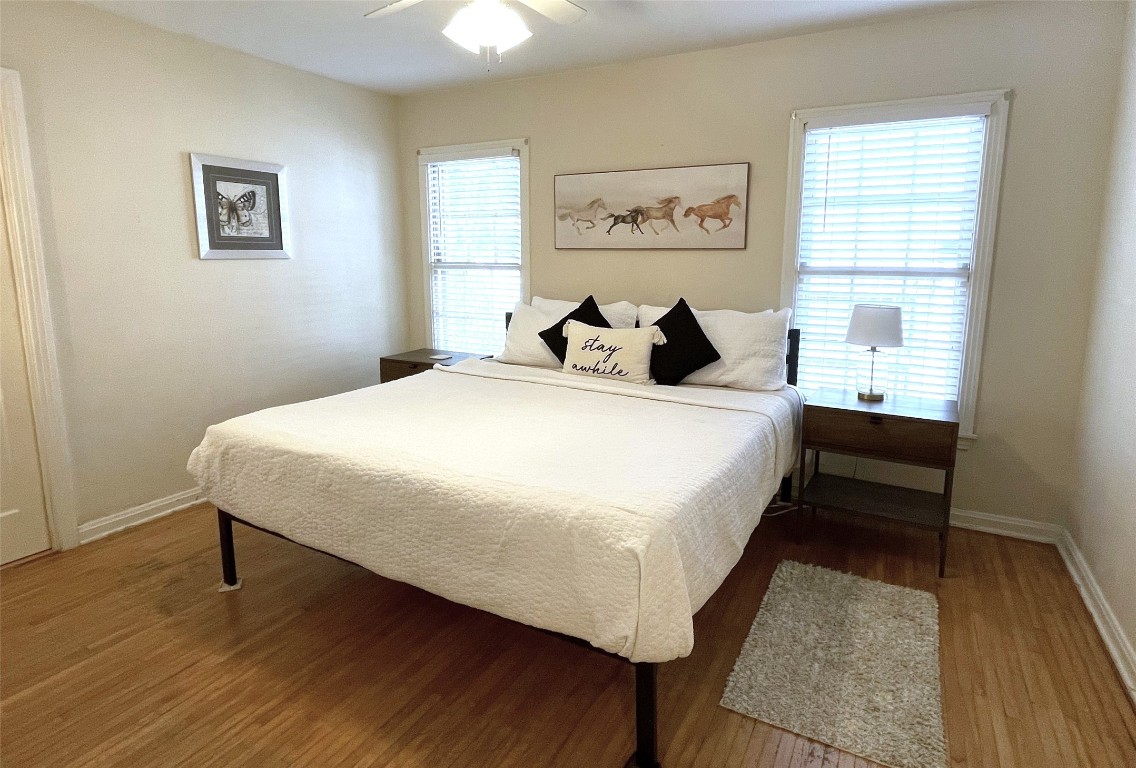 1914 West 38th Street Austin, TX 78731 - Photo 6 of 19 a bedroom with a bed and a table