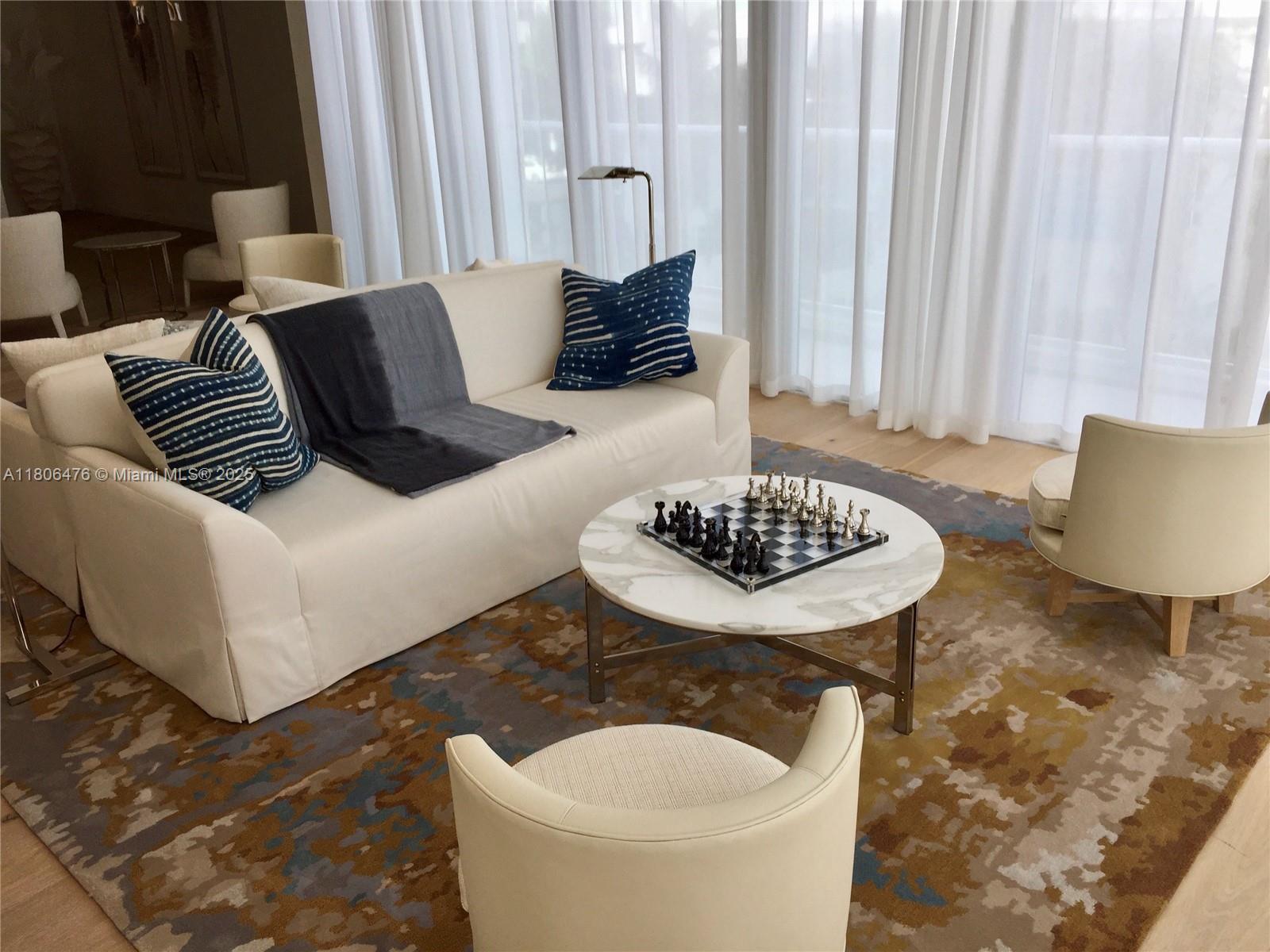 401 North Birch Road, Unit 505 Fort Lauderdale, FL 33304 - Photo 22 of 29 a living room with furniture and a bathtub