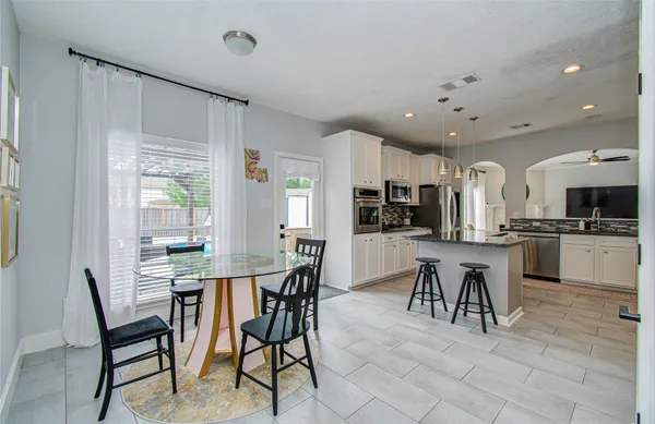 a view of a dining area with furniture