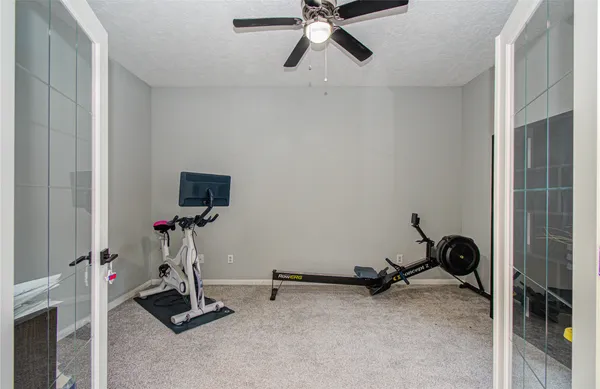 a view of a room with gym equipment