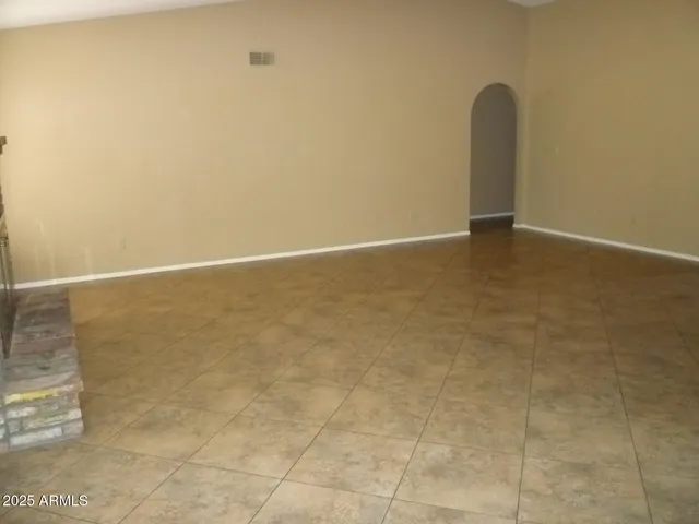 a view of a room with an empty space