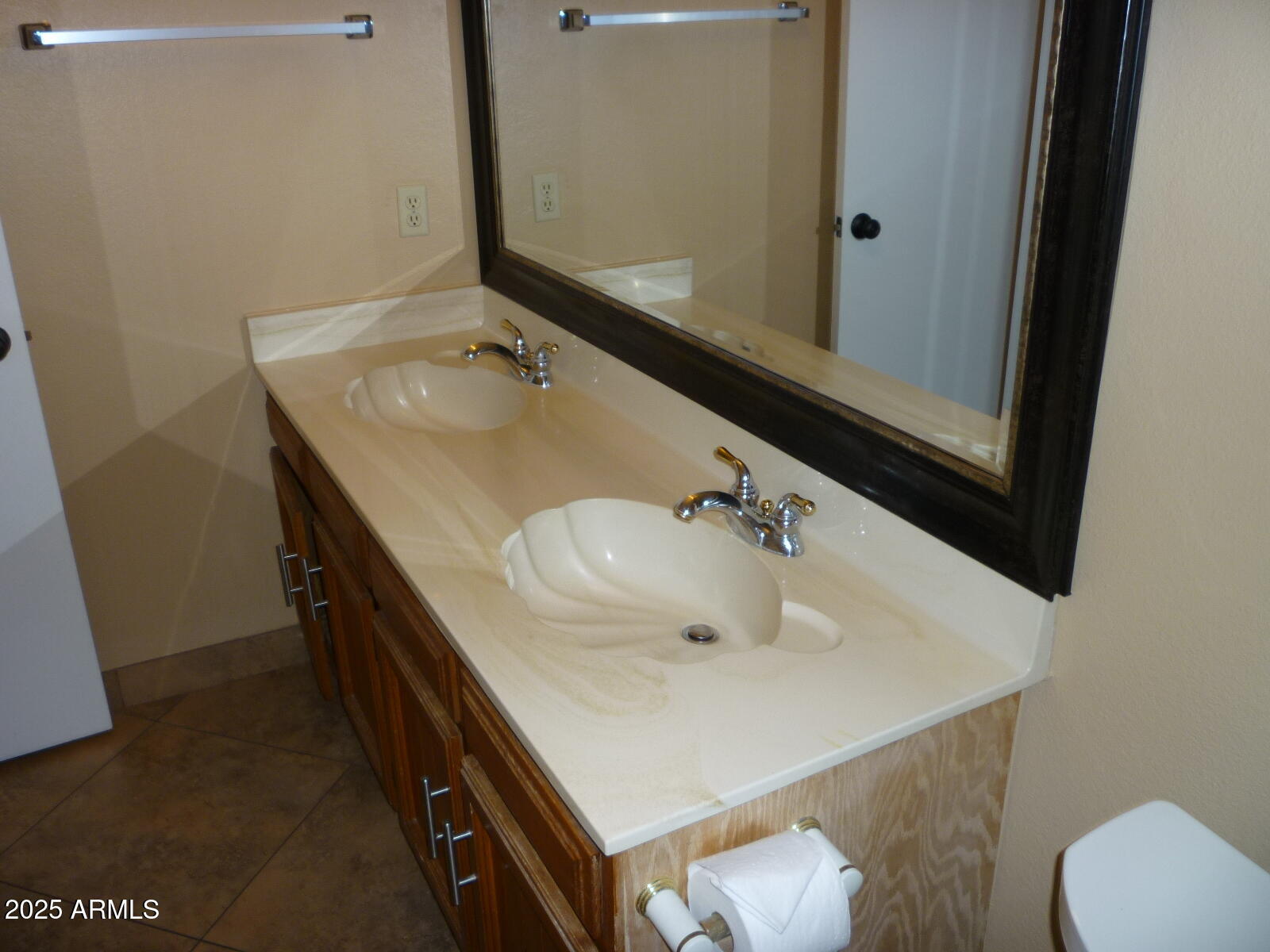 4216 West Willow Avenue Phoenix, AZ 85029 - Photo 6 of 14 a bathroom with a sink and a mirror