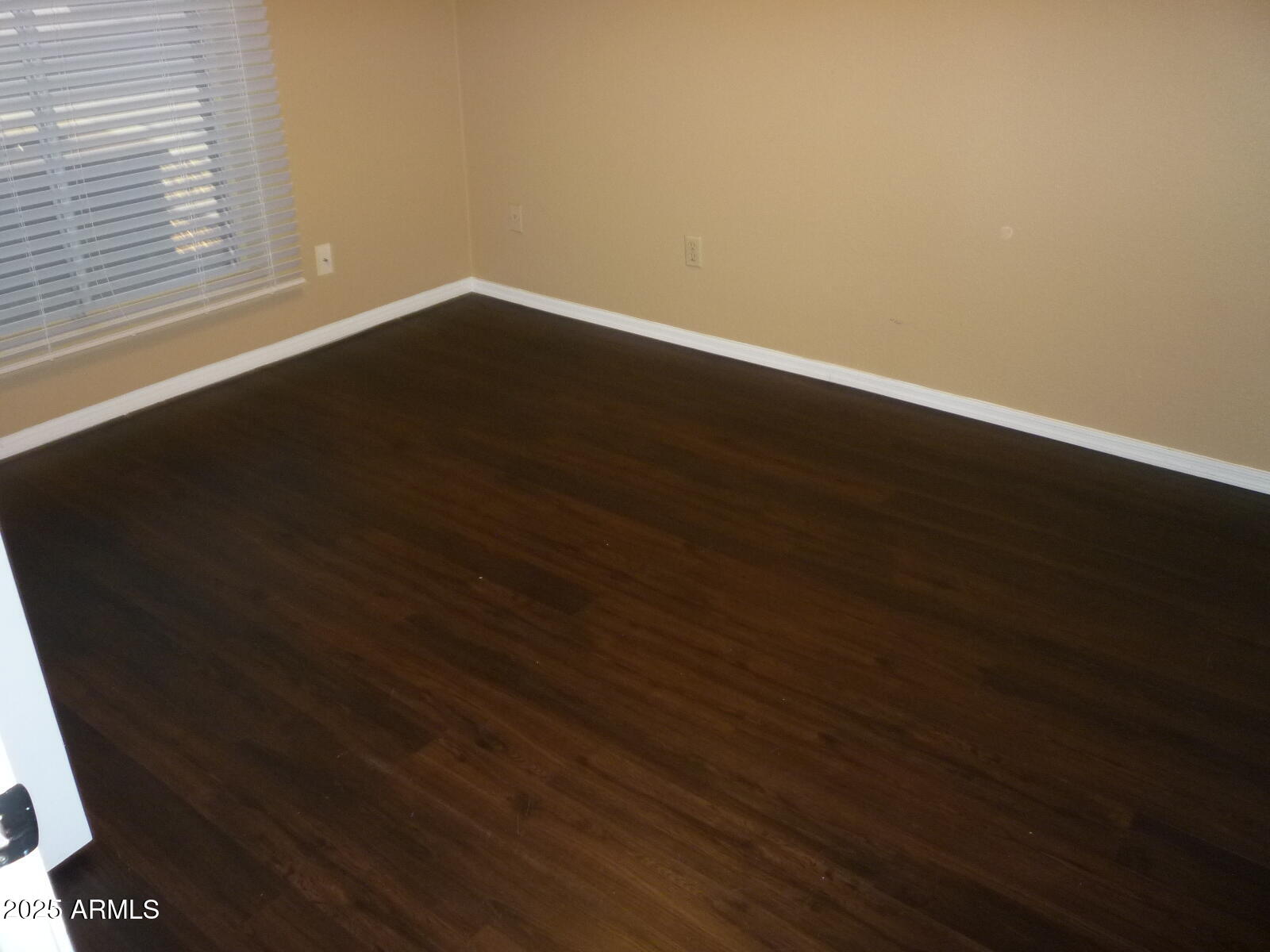 4216 West Willow Avenue Phoenix, AZ 85029 - Photo 8 of 14 a view of wooden floor in a room