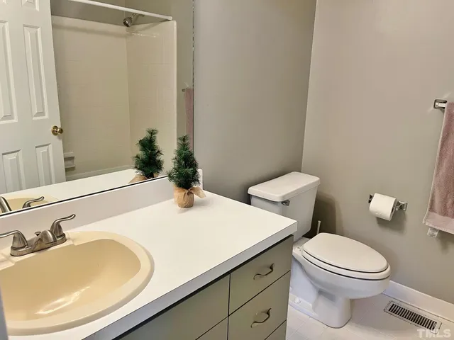 a bathroom with a sink and a toilet