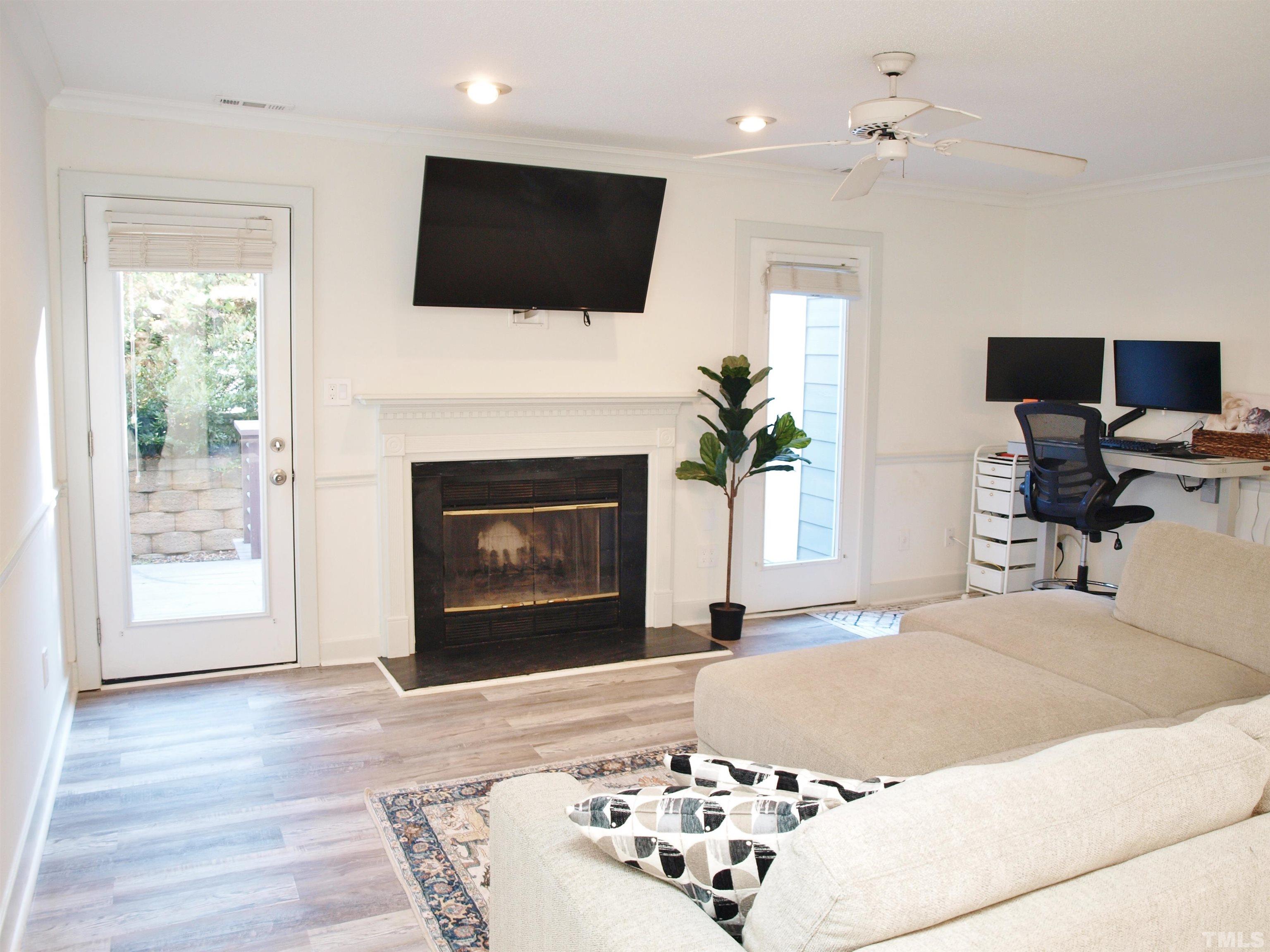 1424 Quarter Point Raleigh, NC 27615 - Photo 7 of 18 a bedroom with a bed and a flat screen tv