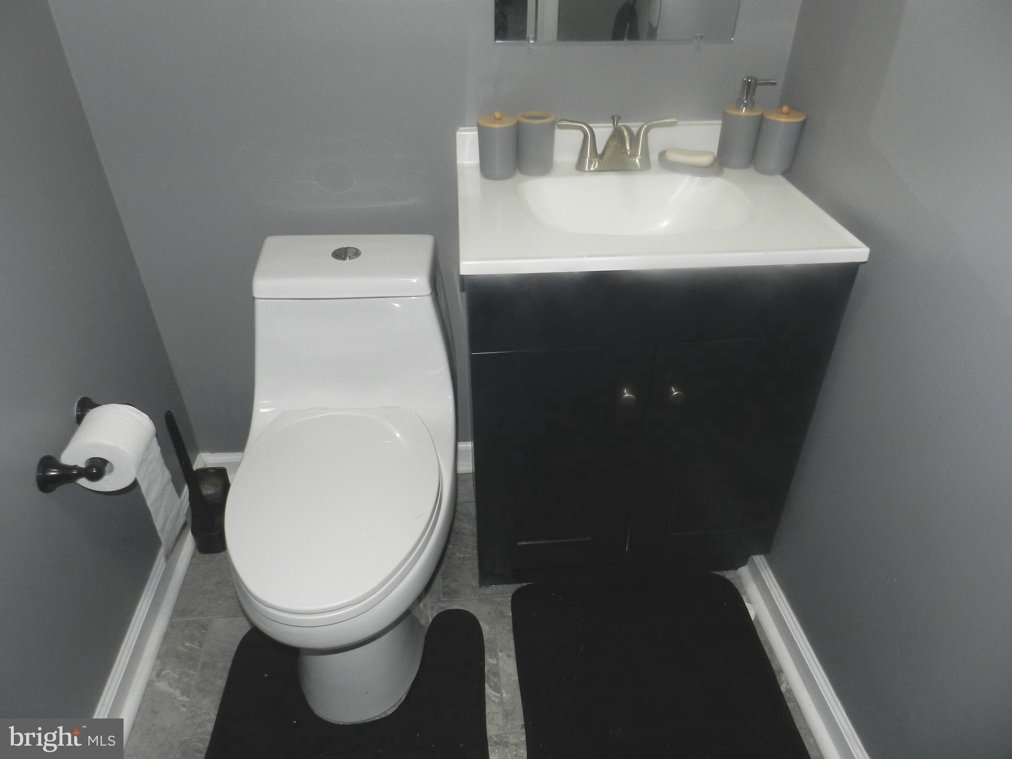 3714 Mayberry Avenue, Unit E Baltimore, MD 21206 - Photo 15 of 28 a close view of a toilet in a bathroom