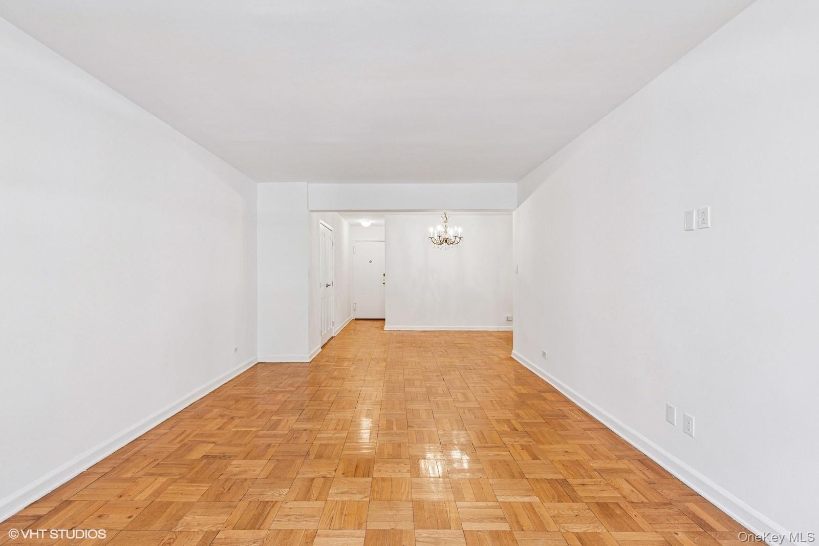 104-20 68th Drive, Unit B19 Queens, NY 11375 - Photo 2 of 15 a view of empty room