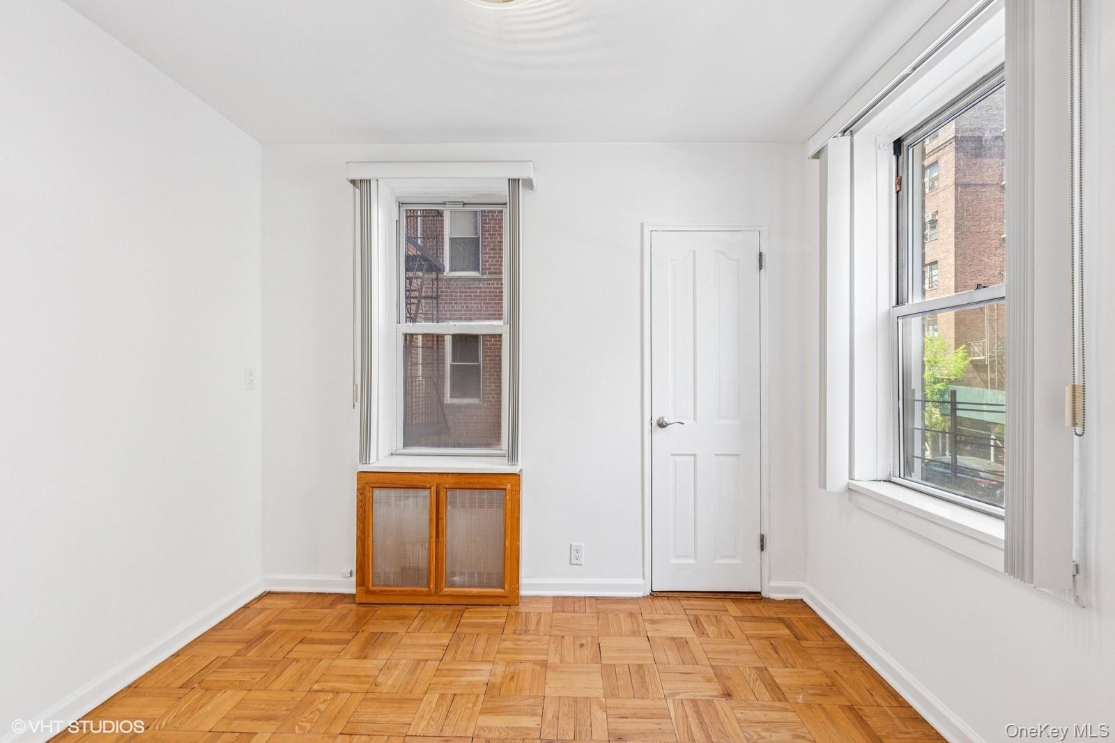 104-20 68th Drive, Unit B19 Queens, NY 11375 - Photo 6 of 15 a view of a room with an empty room