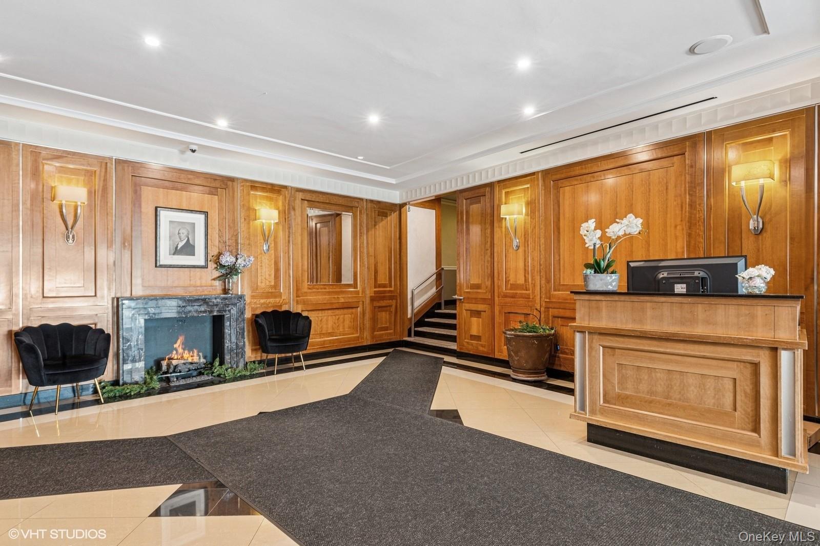 104-20 68th Drive, Unit B19 Queens, NY 11375 - Photo 9 of 15 a room with gym equipment and large windows