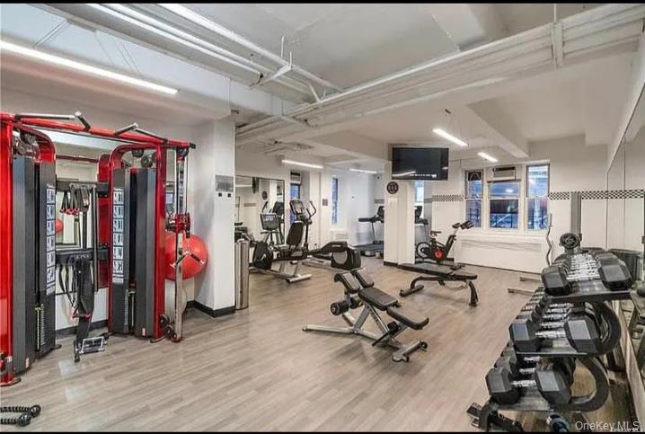 104-20 68th Drive, Unit B19 Queens, NY 11375 - Photo 10 of 15 a view of a room with gym equipment