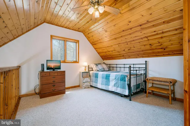 a view of backyard with a baby roof deck