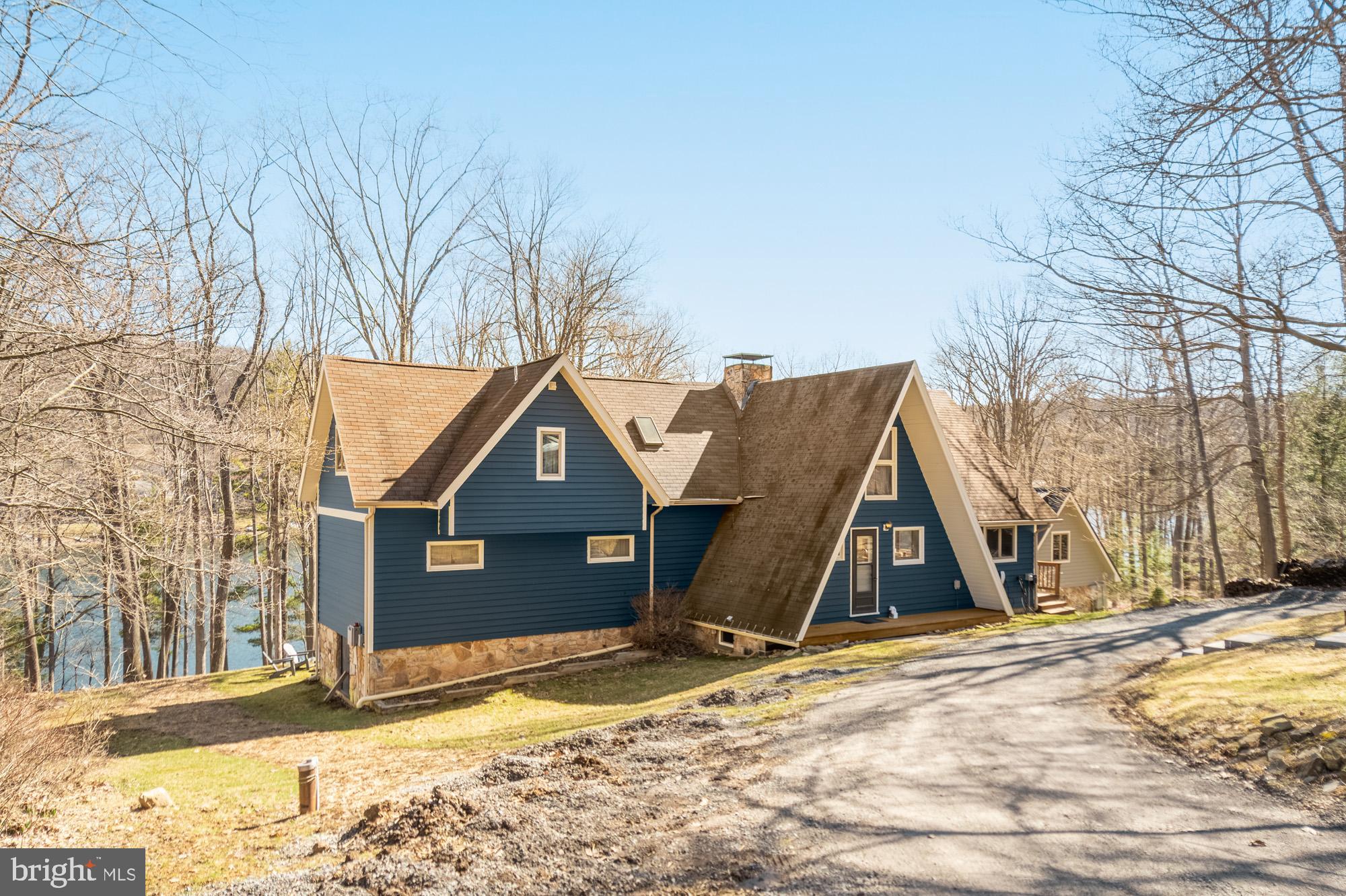 1723 Marsh Hill Road McHenry, MD 21541 - Photo 29 of 40 a view of a house with a snow on the road